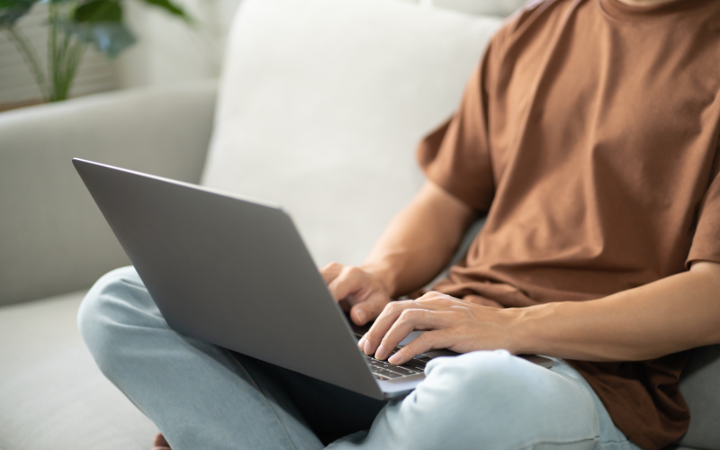 A man using a laptop at home