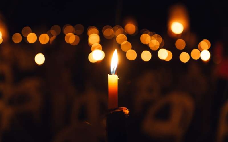 Close-up of a room filled with candlelight