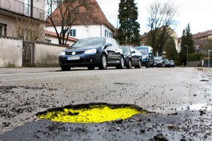Pot of money for pothole repairs to please new car owners?